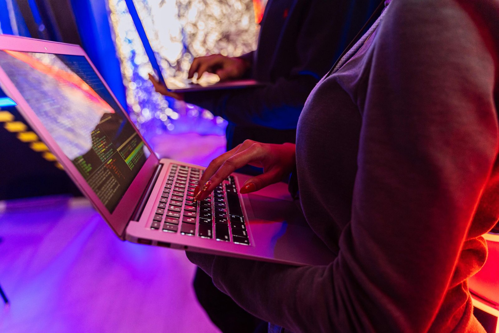 image of  person holding a laptop